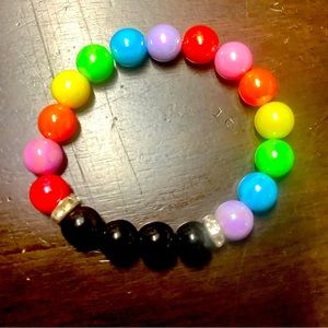 Hand made beaded bracelets with stretchy string to fit all sizes.